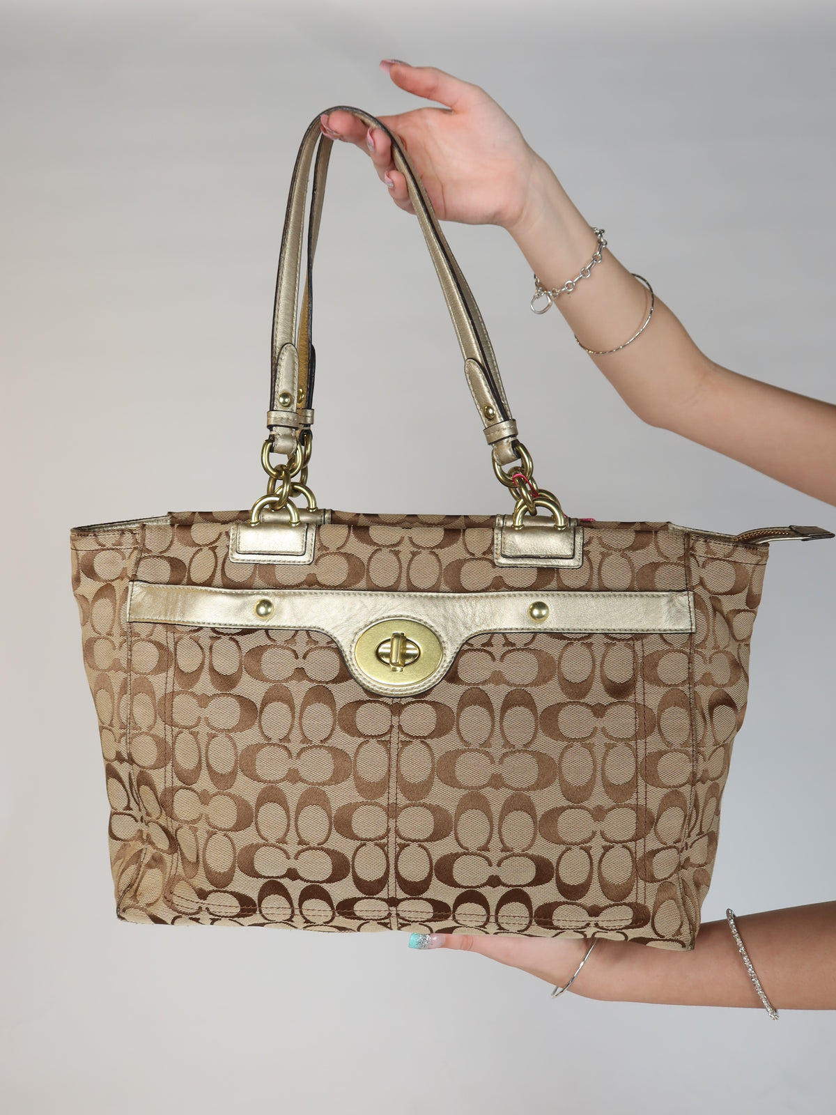 Coach Signature Gold Turn-Lock Tote Bag