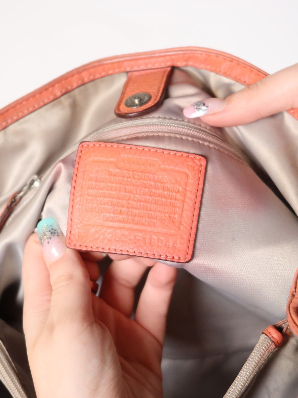 Coach Coral Leather Turn-Lock Bag