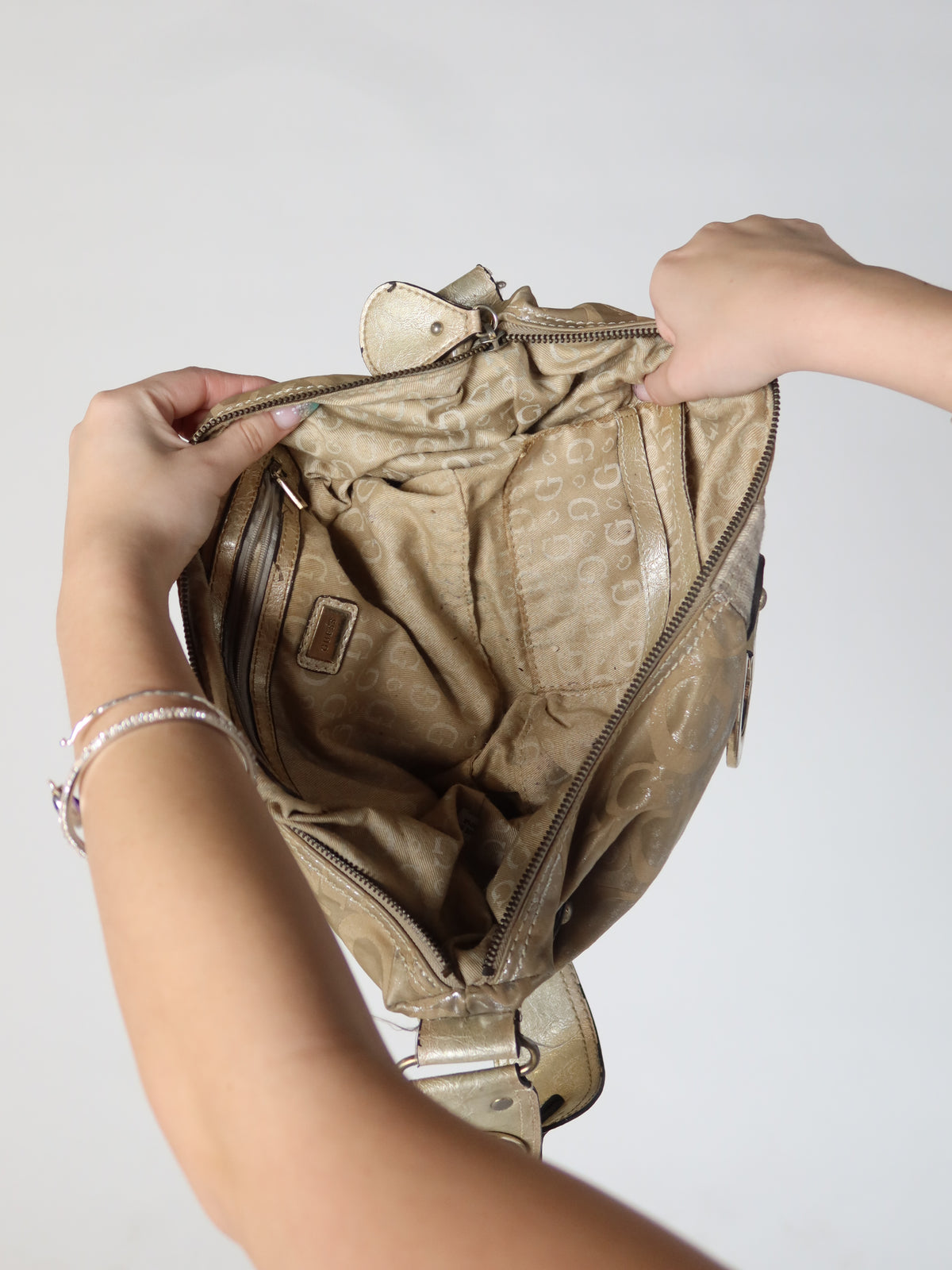 Guess Gold Metallic Monogram Baguette Bag