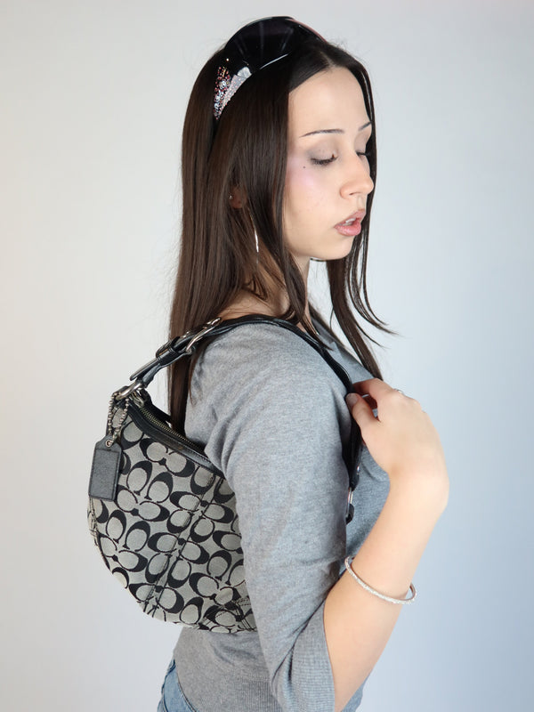 Vintage Coach black bag, Y2K resale fashion at Brat's Closet.