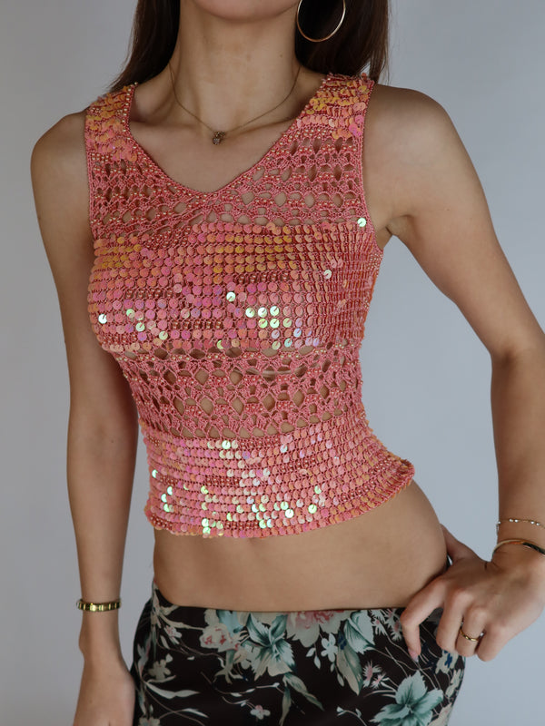 Vintage Y2K pink sequin crochet tank top featuring iridescent embellishments, open-knit construction, sleeveless silhouette, and fairycore-inspired styling.