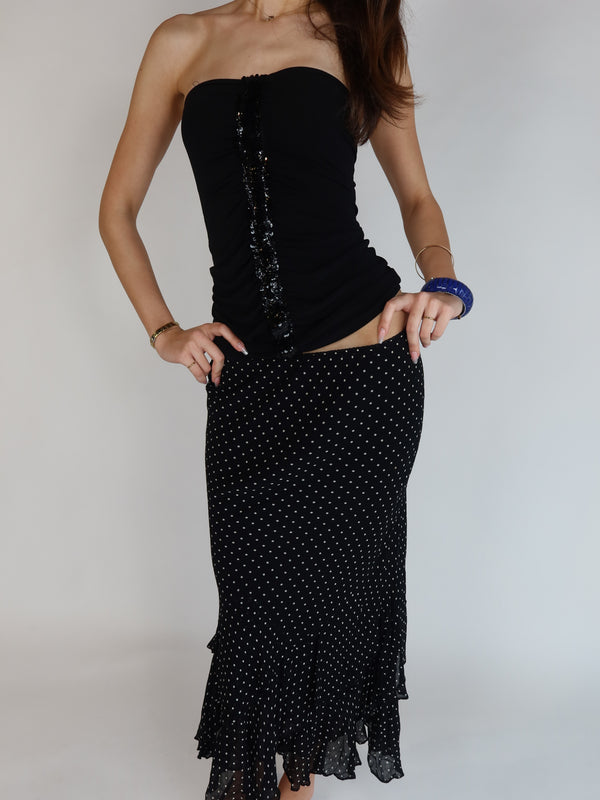 Authentic vintage Y2K black and white polka dot mesh maxi skirt with low-rise waistband and layered ruffle fishtail hemline, Euro Summer aesthetic.