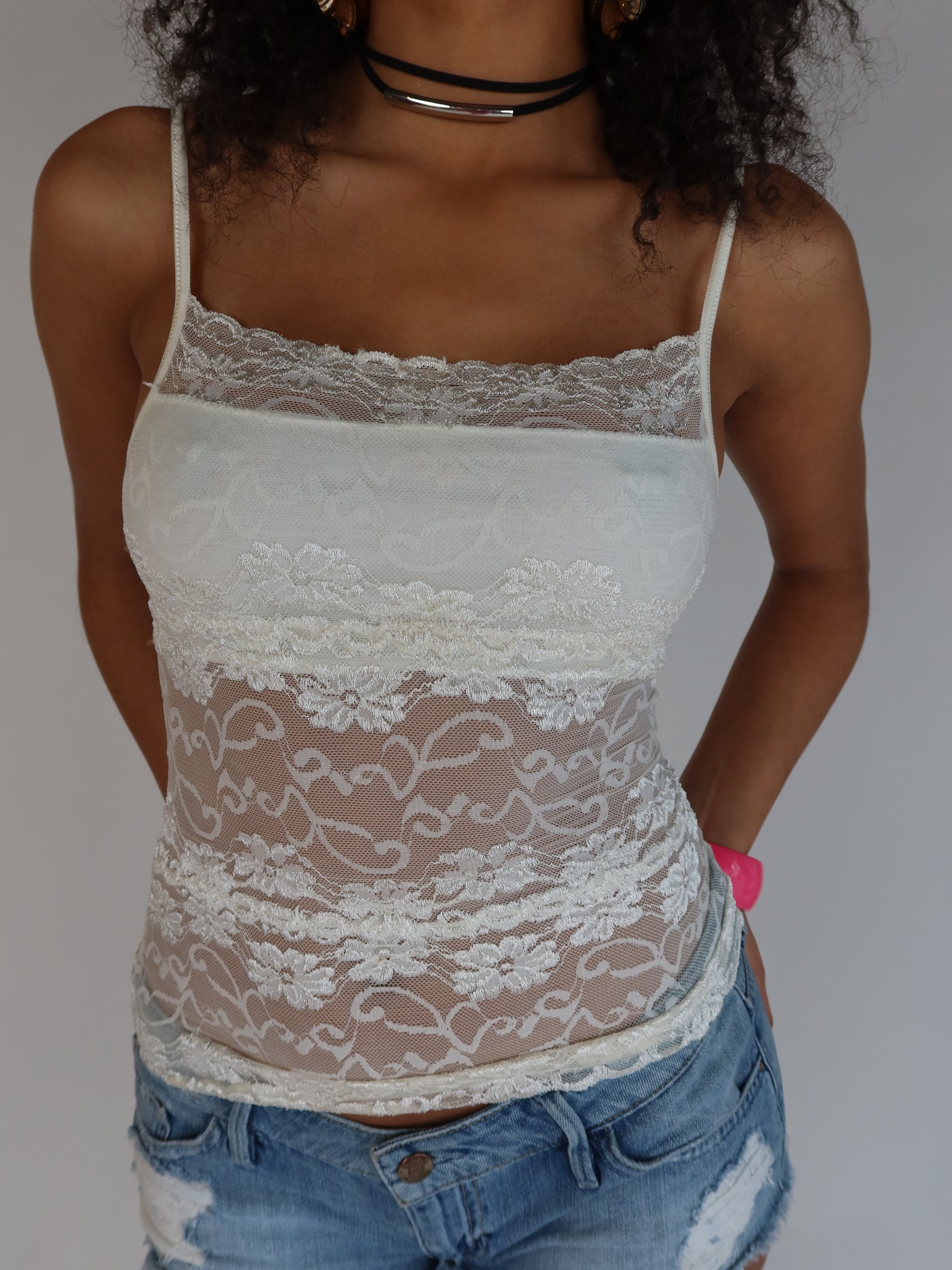 Vintage Y2K ivory lace mesh camisole with floral lace detailing, sheer panels, and adjustable spaghetti straps.