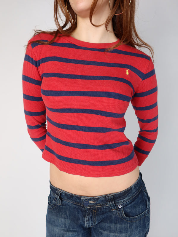 Authentic vintage Y2K Polo Ralph Lauren red and navy horizontal striped waffle knit thermal top with a yellow embroidered logo on the chest, cropped fit, shown from front and back views with low-rise jeans.