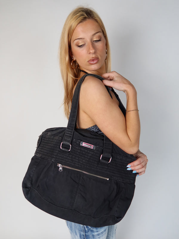 Vintage Diesel black nylon tote bag with floral lining, Y2K resale clothing at Brat's Closet.